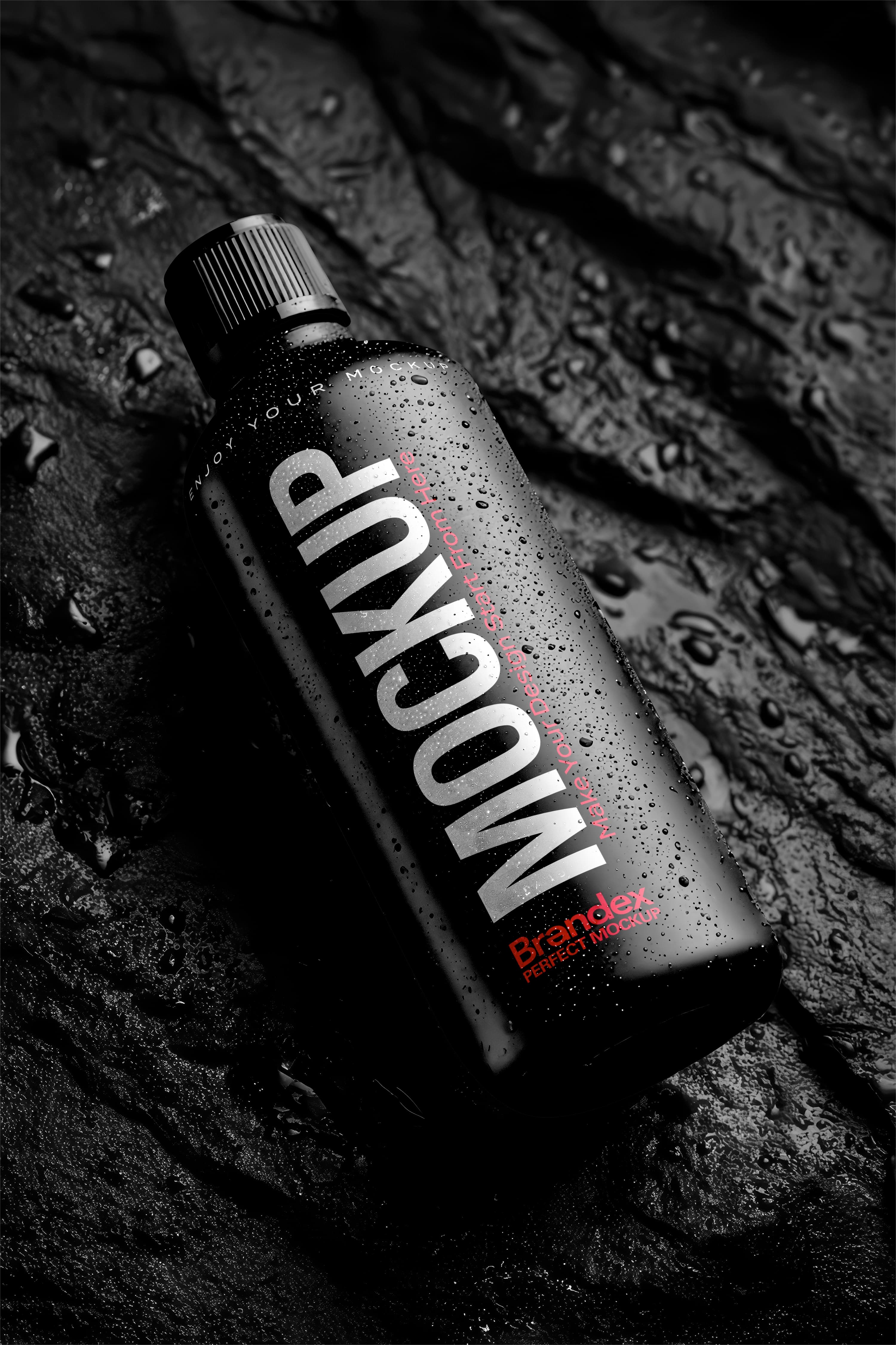 Matte Black Cosmetic Bottle Mockup on Wet Rock Surface