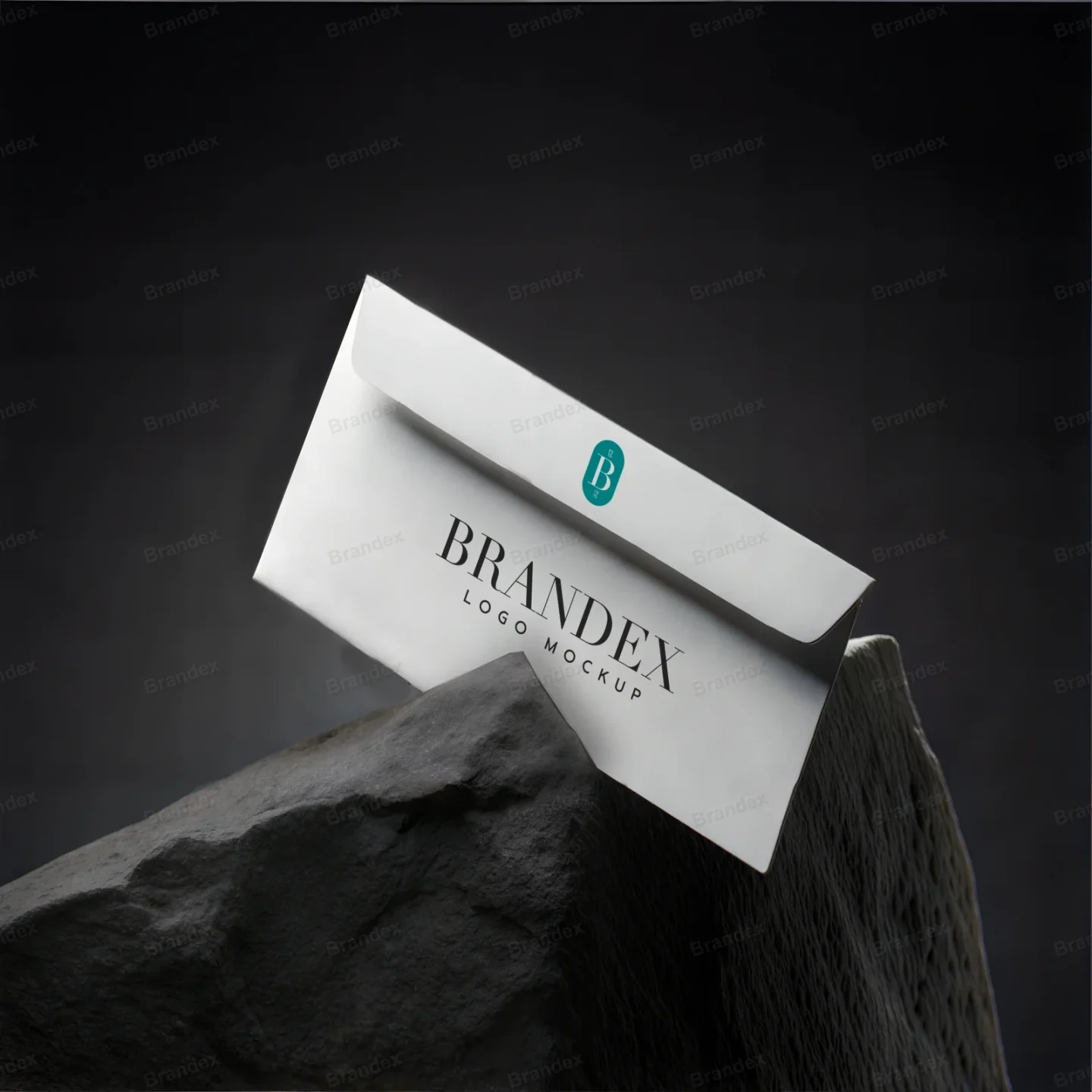 White Envelope Mockup Resting on Dark Stone Block – Minimalist Studio Setup