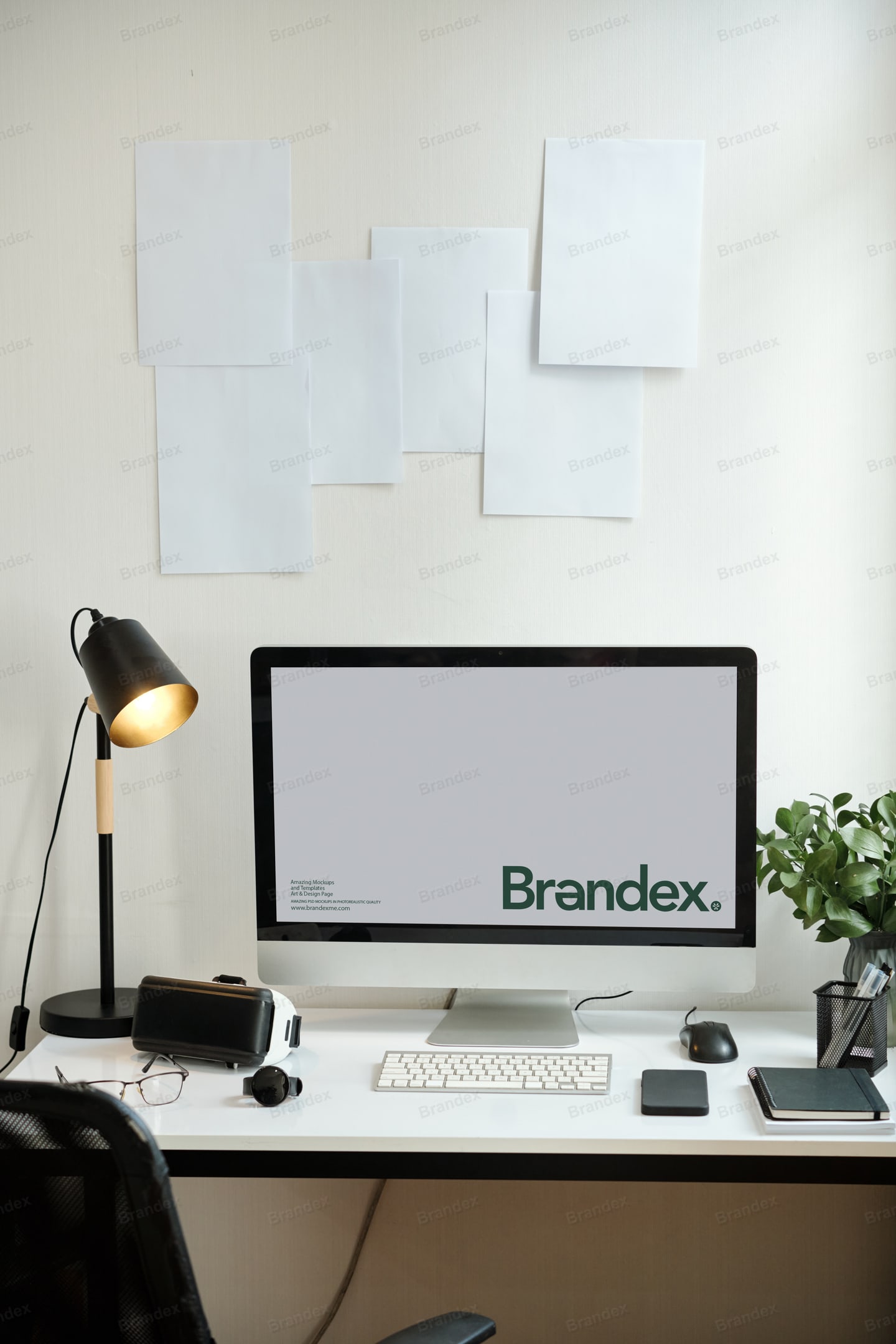 Desktop Computer Screen Mockup in Modern Desk Setup with Mood Board Wall